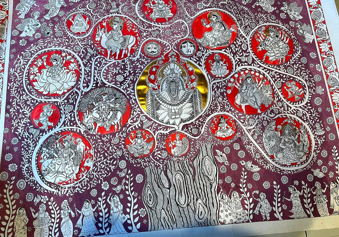 Mata ni Pachadi — tree of deities with circular medallions in silver on deep crimson canvas